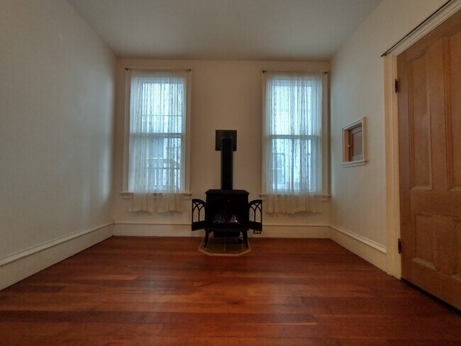 Gas fireplace in dining area - 42 Elmwood Ave