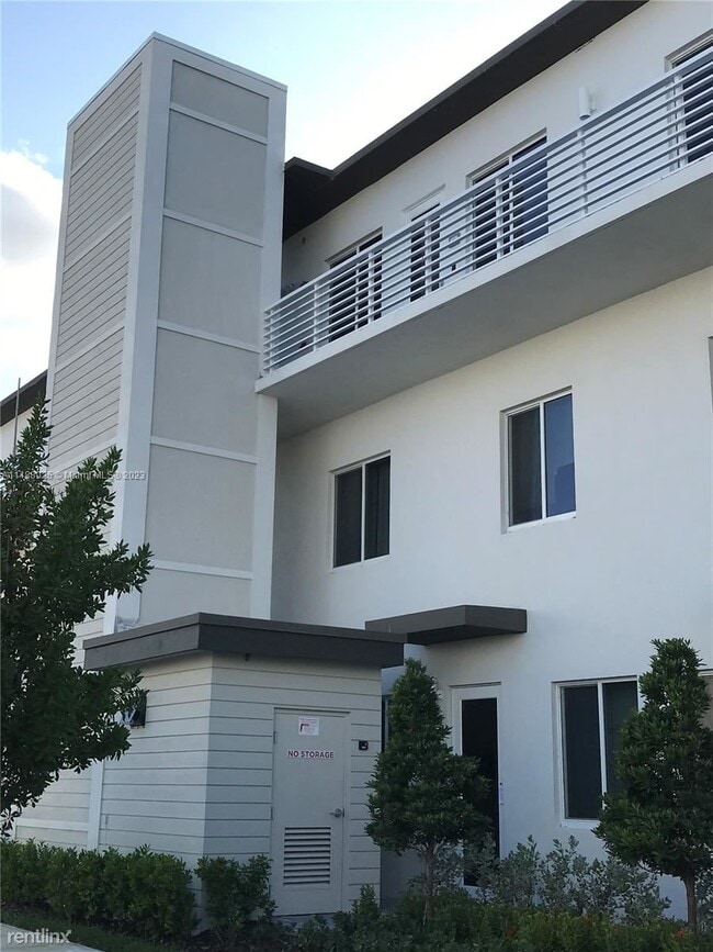 Building Photo - 3 br, 2 bath House - 6416 NW 102nd Ct Apt 306