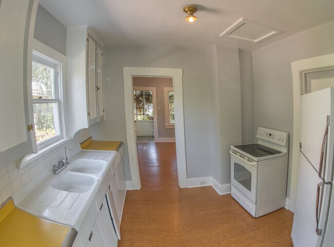 Updated kitchen still has nuances of vintage period. - 127 1/2 Keystone Ave