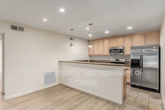 Building Photo - 4704 E Paradise Village Pkwy N