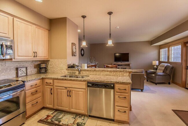 Building Photo - 1 Bedroom | 1.5 Bathrooms | 2 Flexible Bonus Spaces | Luxury Riverstone Condo