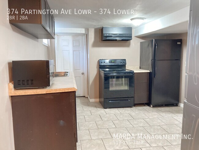 Photo du bâtiment - COZY 2BED/2 BATH LOWER UNIT INCLUSIVE W/ $75 CAP!!