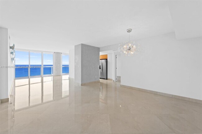 Building Photo - 6365 Collins Ave