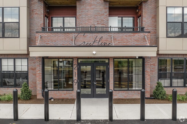 Front entrance of Creekline at Fairfield apartments in Fairfield, CT - Creekline at Fairfield