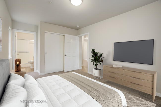 Unidad de 2 dormitorios, dormitorio principal - Legacy Oaks Apartments