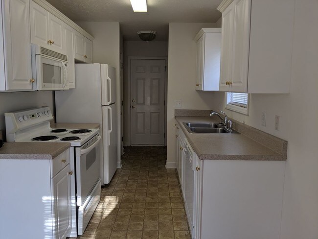 Foto del edificio - LARSON PLACE TOWN HOMES