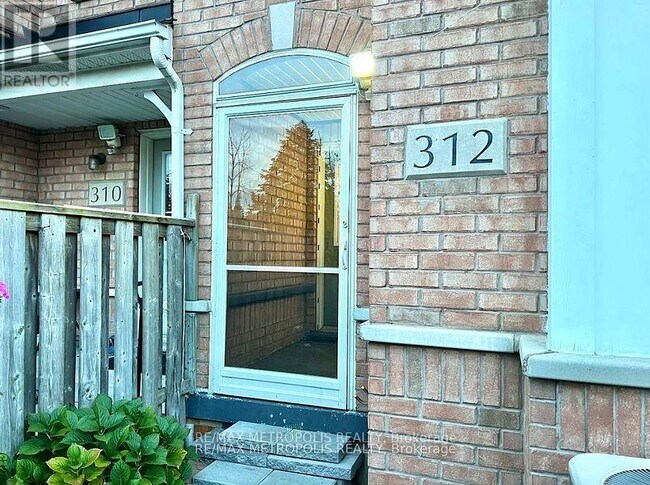 Photo du bâtiment - 312 McLevin Ave