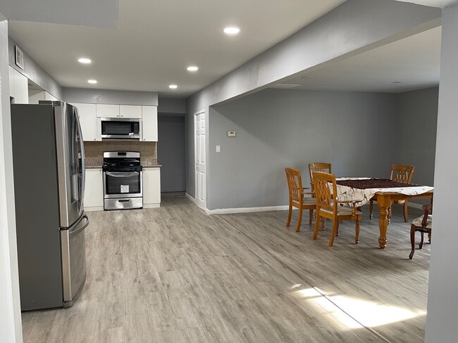 Kitchen and family room area - open floor plan - 15013 Hartsook St