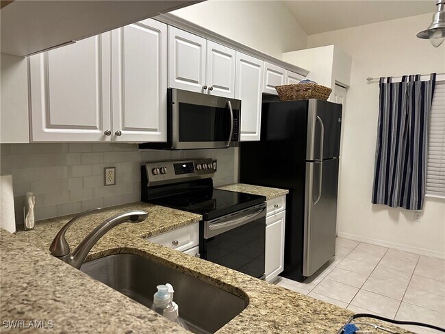 Foto del edificio - 6605 Huntington Lakes Cir