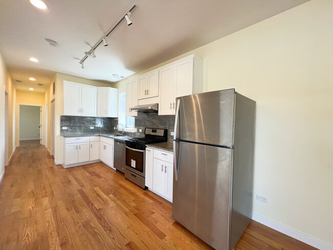 Building Photo - 213 W 25th Pl