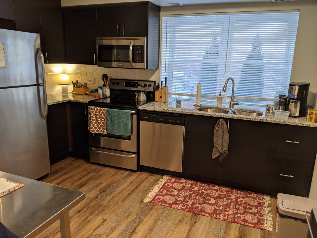 New kitchen with SS appliances and Granit cou - 6626 W Devon Ave
