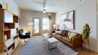 Located at 3330 W 4000 S in West Haven, Utah, this single-floor residence offers a thoughtfully designed open-concept layout with modern finishes and a neutral, contemporary aesthetic throughout.

The kitchen is a standout space, featuring two-tone cabinetry with dark wood lower cabinets and crisp white upper cabinets, complemented by a classic white subway tile backsplash and light quartz countertops. Stainless steel appliances, open shelving, and a central island with bar seating add both functionality and style. Light wood-style flooring flows seamlessly into the adjacent living area, which is anchored by a ceiling fan, large windows, and a private exterior door that allows natural light and outdoor views to fill the space.

The bedrooms are well-appointed and restful, each featuring large windows that frame views of the surrounding landscape and mountains. The rooms offer ample space and are finished with the same light wood flooring found throughout the residence.

The bathrooms maintain the home's clean, modern character, with wood-tone vanity cabinetry, white quartz countertops, light hardwood-style flooring, and tub-shower combinations. The overall ambiance of the residence is bright, cohesive, and functional, making it a comfortable and stylish living environment in the West Haven community.
