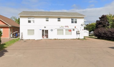 Building Photo - 10535 Rue Principale