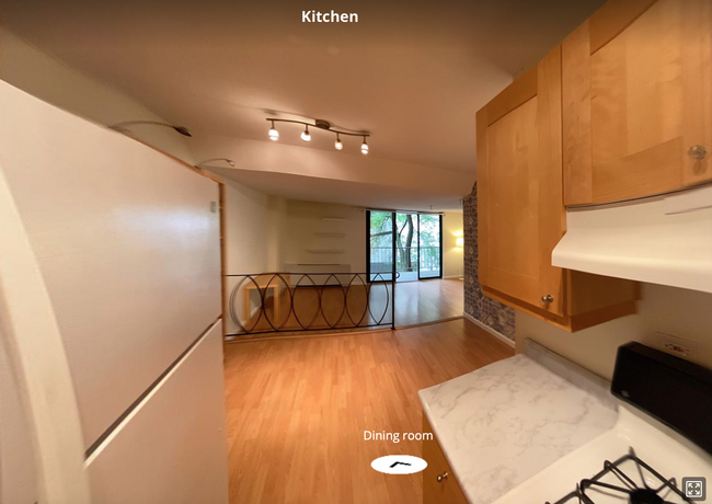 View of Dining, Living and Balcony from Kitchen - 2201 L St NW