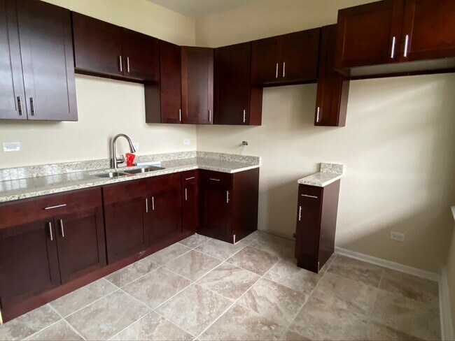 Foto del edificio - 7120 S Emerald Ave