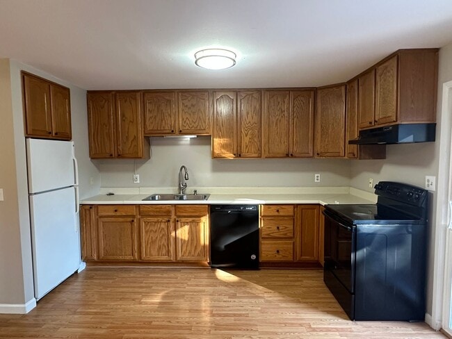 Building Photo - Spacious & Stylish 3BD Home with Iconic Stone Fireplace + Soaking Tub