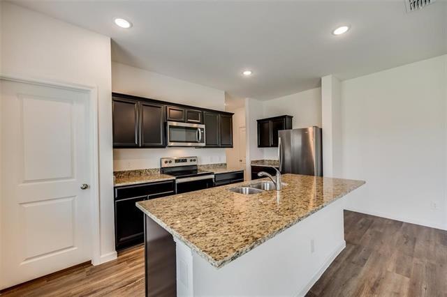 Foto del edificio - 713 Peach Tree Ln