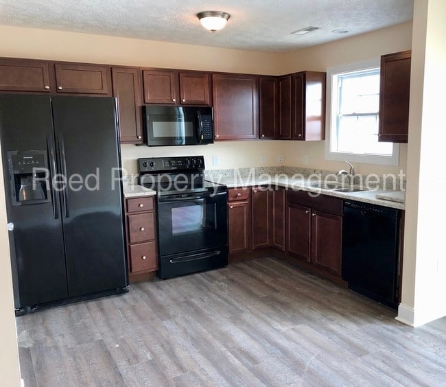 Building Photo - 630 Pin Oak Drive Northwest