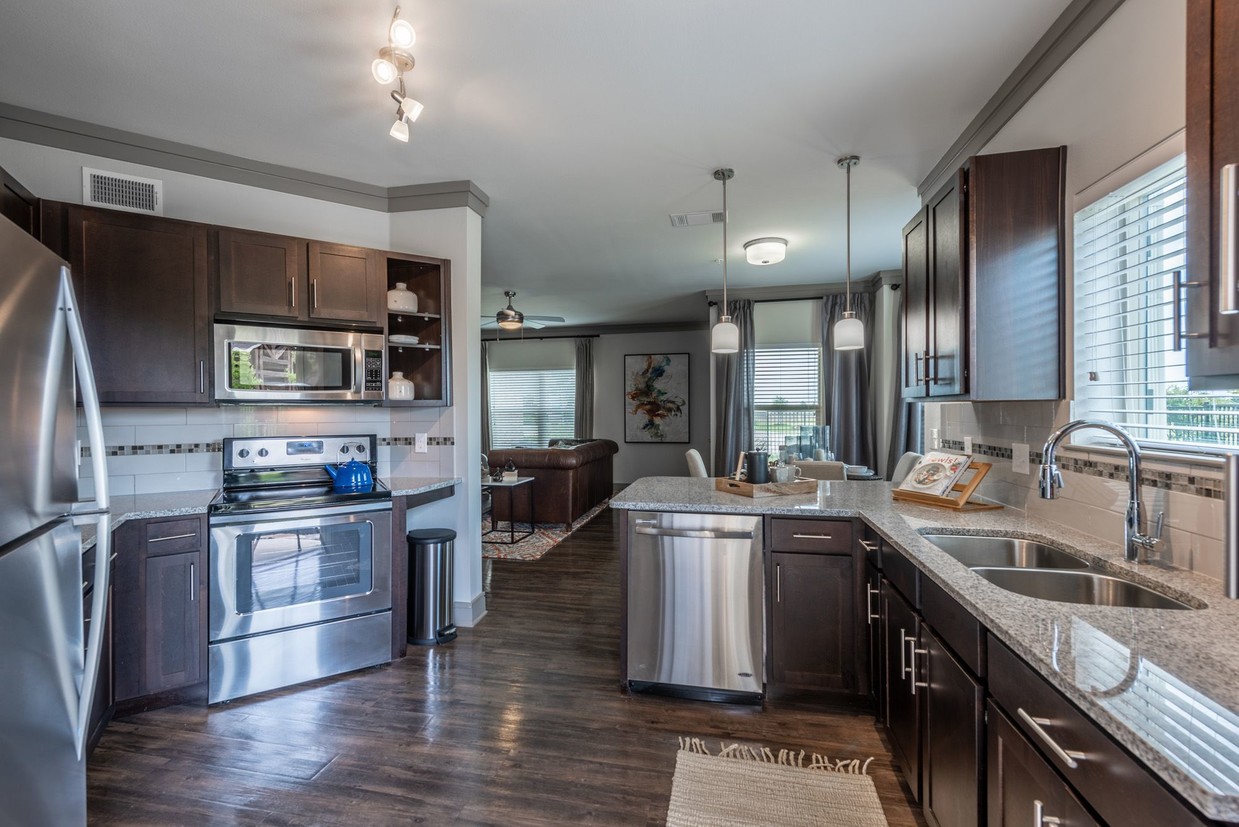 Custom Cabinetry with Designer Hardware - Cortland Windsong Ranch