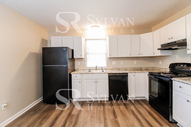 Building Photo - Step into sunshine and serenity at 1702 Ra...
