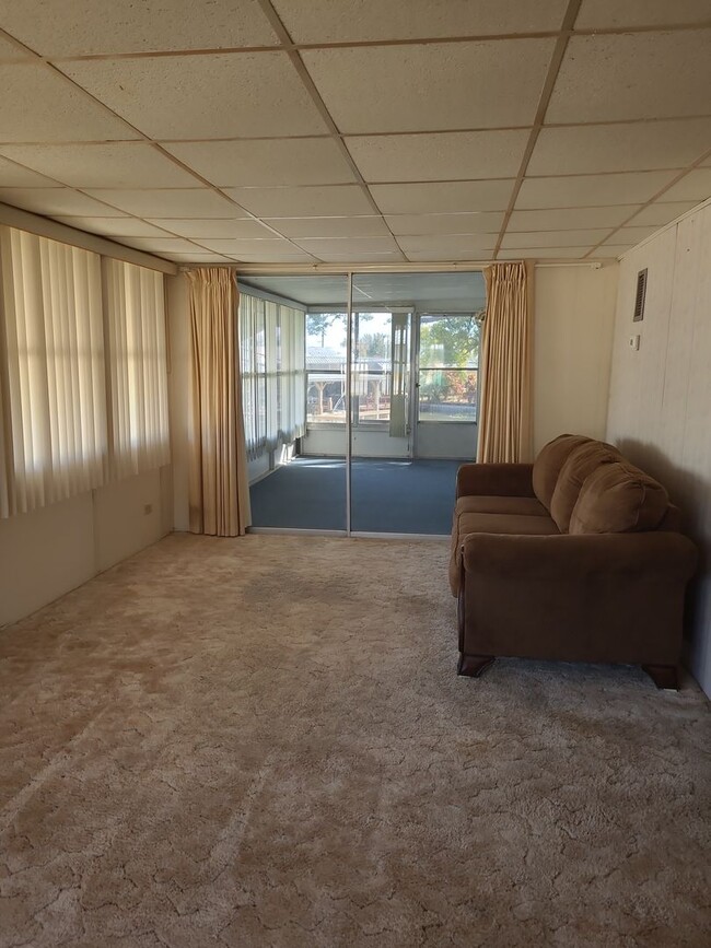Building Photo - 55+ mobile home community. On canal to bea...