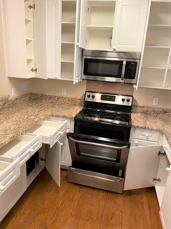 The entire Townhome has been Professionally cleaned, inside and out- cabinets, behind appliances - 314 S Cedar St
