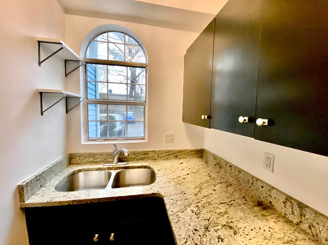 Upgraded kitchen area. - 4240 Wilshire Blvd Apartment