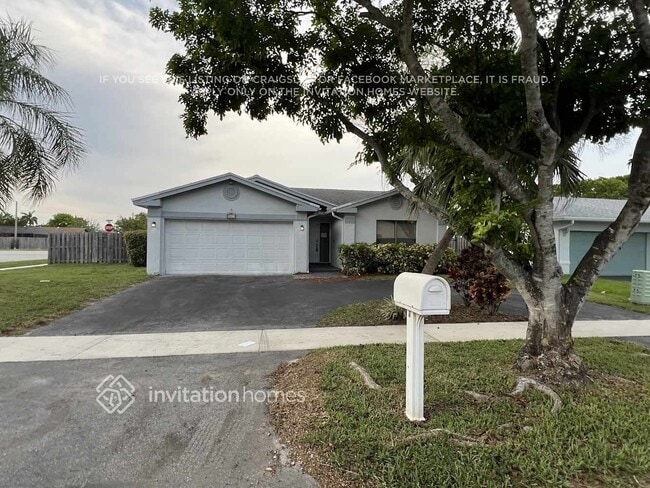 Building Photo - 9821 NW 41st Ct