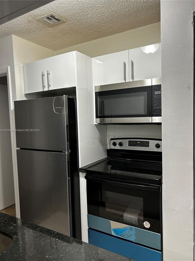 Building Photo - 18312 NW 68th Ave