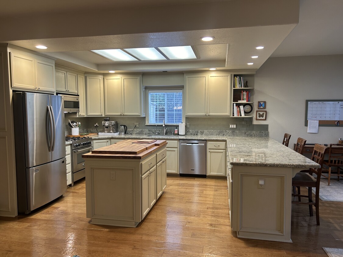 Updated and open kitchen area with bar for eating - 1830 Glenn Pl