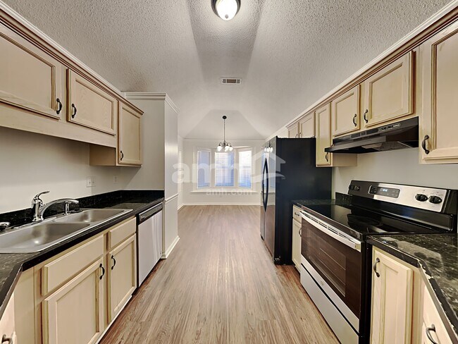 Foto del edificio - 10085 Woodland Grove Dr