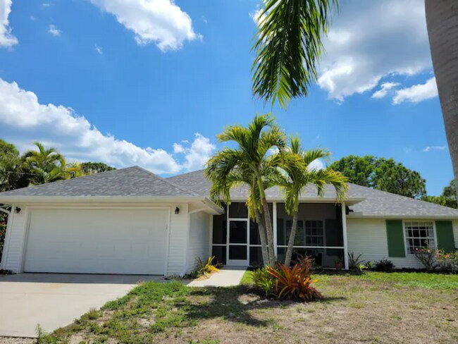 Front with 2-Car Garage - 11771 Tawas Ct House