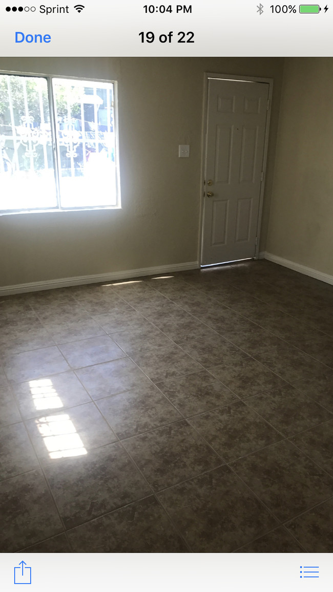 New Tile Flooring - 2917 W Florence Ave