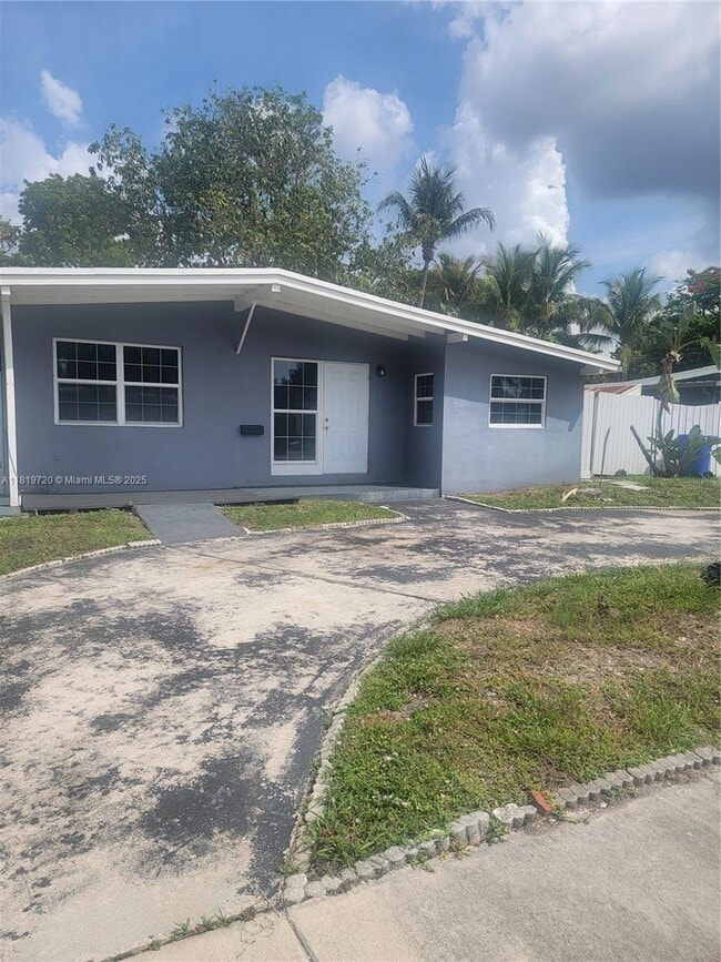 Building Photo - 1571 NE 43rd Ct