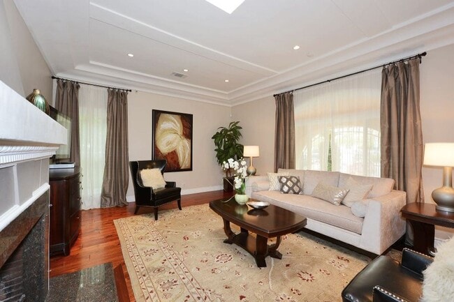 Building Photo - Welcome to this beautifully updated Spanis...