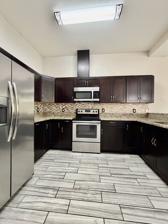 Foto del edificio - 4848 Tampa Downs Blvd