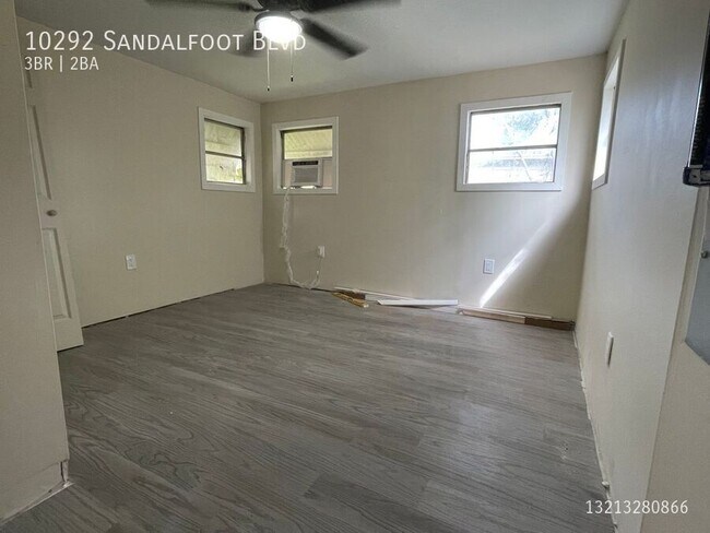 Building Photo - 10292 SW Sandalfoot Blvd