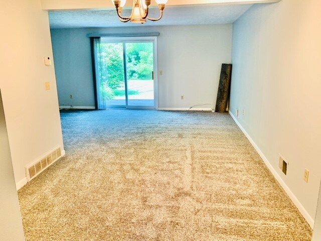 Dining room facing living room. - 23 Willowick Dr