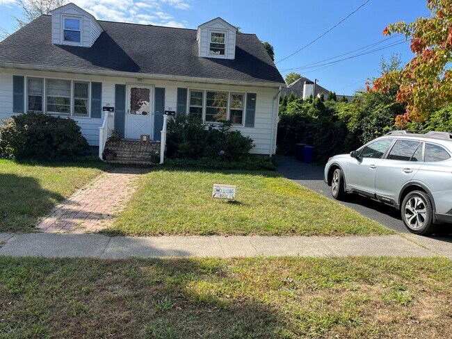 Front of house with driveway - 27 Blake Dr