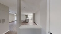 This 850 square foot apartment in Kennesaw, GA offers a thoughtful layout with 2 bedrooms and 3 bathrooms. The space features modern finishes throughout, including sleek wood-look flooring and neutral-toned walls that create a bright, airy atmosphere. The primary bedroom, measuring 150 square feet, provides ample space for comfortable living.

The kitchen showcases contemporary white cabinetry, stainless steel appliances, and a stylish backsplash. A convenient kitchen island with a sink adds extra counter space and functionality. The open-concept design seamlessly connects the kitchen to the living area, ideal for entertaining or everyday living.

Each bedroom is equipped with a ceiling fan and window, ensuring good air circulation and natural light. The bathrooms feature clean lines with white fixtures and tiled surroundings. The in-unit laundry room, complete with a washer and dryer, adds convenience to daily life.

Storage solutions are integrated throughout, including closet spaces with wire shelving. The apartment's single-floor layout enhances accessibility and ease of movement. Overall, this property combines modern aesthetics with practical amenities, offering a comfortable and efficient living space in a desirable Kennesaw location.