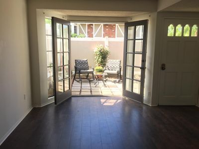 living room with French door. - 102 Greenbriar Ln
