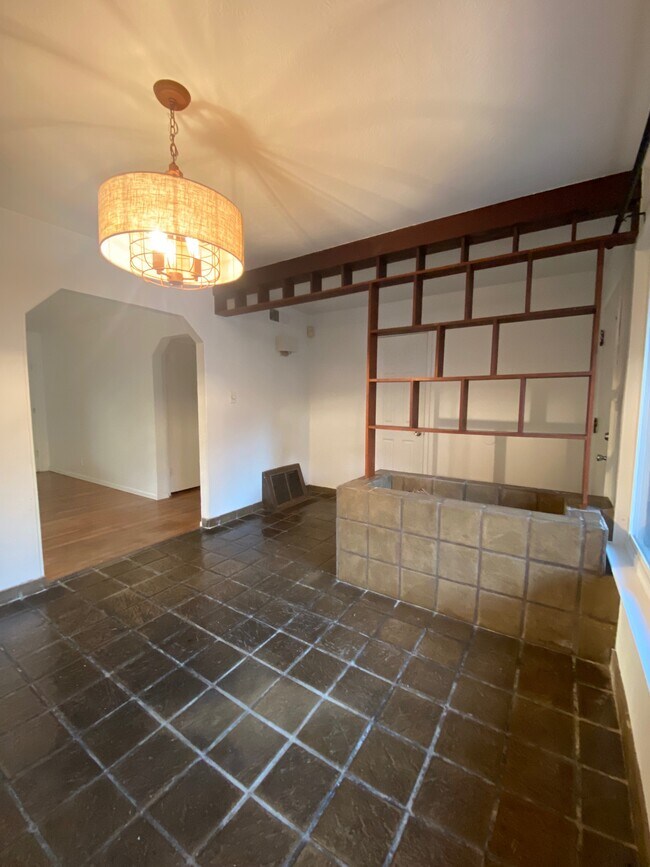 Dining Room with Planter and open Book Shelves - 3739 Circle Dr W