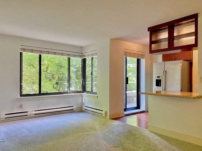 Main room with Breakfast Bar, Corner Window and door to private deck - 1105 Spring St