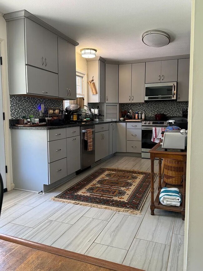 Building Photo - West Asheville Home with Private Fenced Yard & Spacious Layout