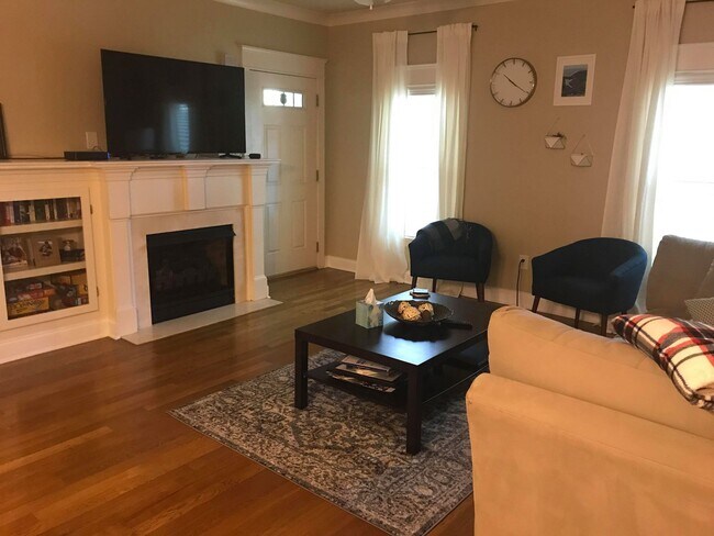 Living Room- Gas Fireplace with Built-In Bookshelf - 655 Mead St SE