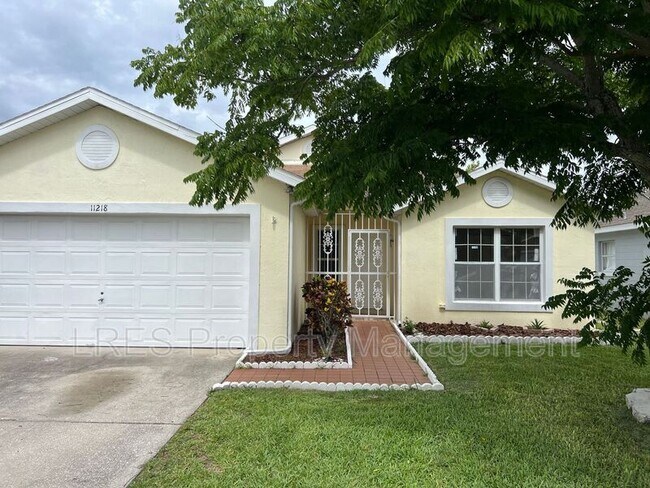 Foto del edificio - 11218 Worley Ave