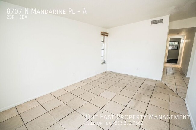 Building Photo - 8707 N Mandarine Pl