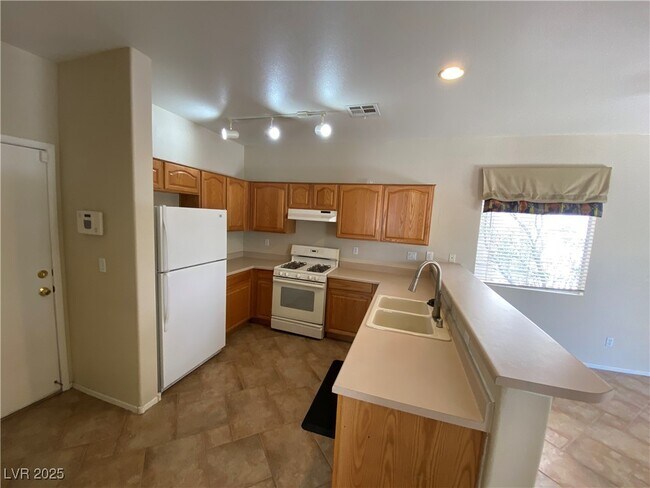 Foto del edificio - 8825 Rambling Rock Ct