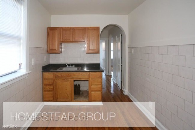 Foto del edificio - 4105 W Belmont Ave