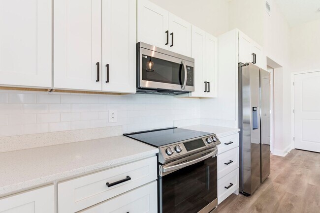 Building Photo - WATER & SOLAR INCLUDED - BRAND NEW 3 bed /...